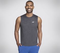 Stay dry and comfortable in bicep-friendly style wearing Skechers GO DRI Charge Muscle Tank. This sleeveless muscle tank features our soft moisture-wicking and quick-drying GO DRI fabric. | Skechers Men's GO DRI Charge Muscle Tank Top | GO DRI ALL DAY fabric is a lightweight performance jersey that has active stretch, quick dry technology and breathability to keep you cool and comfortable all day long | Sleeveless crewneck silhouette | Active Fit | 100% Polyester | Reflective Skechers logo detail at the nape Gray Sleeveless Activewear For Running, Gray Sleeveless Top For Running, Sleeveless Activewear For Training In Athletic Heather, Athletic Heather Sleeveless Tank Top For Sports, Functional Sleeveless Activewear In Athletic Heather, Athletic Fit Muscle Tee With Go-dry For Sports, Athletic Heather Sleeveless Functional Top, Athletic Fit Go-dry Muscle Tee For Sports, Gray Sleeveless Running Activewear