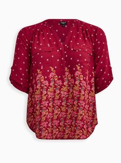 A skull floral print gives this pullover blouse a modern update that will have you looking and feeling incredible. Georgette woven fabric. Split neck. 3/4 roll-tab sleeves. Hidden button placket. Chest pockets. Shirttail hem. CONTENT + CARE Polyester. Wash cold; line dry. Imported plus size tops. SIZE + FIT Model is 5'10”, size 1. Size 2 measure 30” from shoulder. The best plus size women's harper georgette pullover 3/4 sleeve blouse the in floral red made of georgette. These dressy clothes and work-wear, office-wear, career-wear, and business-wear will make you look professional to nail your job interview and wear to work every day. You'll want to wear these basics every day. Floral Print 3/4 Sleeve Workwear Top, Floral Print 3/4 Sleeve Tops For Work, Red Chucks, Blouse Images, Fitted Wedding Dress, A Skull, Career Wear, Lavender Color, Tunic Shirt