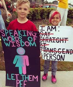 two children holding up signs that say speaking words of wisdom and let them pee