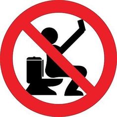 there is a sign that warns people not to sit on the toilet