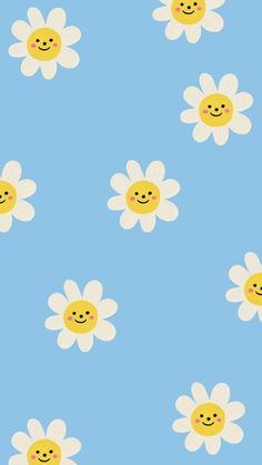 a blue background with white flowers and smiling faces on the center one flower is yellow