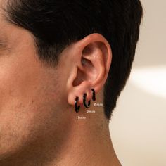 M E N ' S ∙ B L A C K ∙ H O O P S Edgy yet minimalist, our sleek Black Hoops will elevate any outfit. Whether dressed up for a special occasion or sporting a casual everyday look, these versatile earrings are a must-have in his collection. Grab all three sizes to create a set and you have the perfect gift for him! * Material: Stainless Steel ∙ Hypoallergenic ∙ Waterproof ∙ Tarnish Free * Finish: Black IP * Inner Hoop Dimensions: Small - 6mm, Med - 9mm, Large - 11mm * Sold as Pairs O T H E R ∙ I Black Hoop Earrings Men, Hoop Earrings Men, Boyfriend Gift Birthday, Initial Tag Necklace, Black Drop Earrings, Sideways Initial Necklace, Black Hoops Earrings, Dainty Initial Necklace, Mens Earrings Hoop