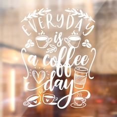 a coffee shop window with the words everyday is a coffee day