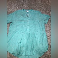 This Item Is From A Pet And Smoke Free Location. It’s Nwot With The Extra Button Still Attached. It’s Like A Blue Green Light Turquoise Color. It’s A Very Lightweight Shirt. Casual Split Neck Top With Buttons, Casual Blouse With Buttons And Split Neck, Casual Turquoise Beach Blouse, Light Blue Buttoned V-neck Blouse, Casual Turquoise Cotton Blouse, Casual Turquoise Short Sleeve Blouse, Blue Henley Neckline Top For Spring, Casual Turquoise V-neck Blouse, Casual Green Split Neck Top