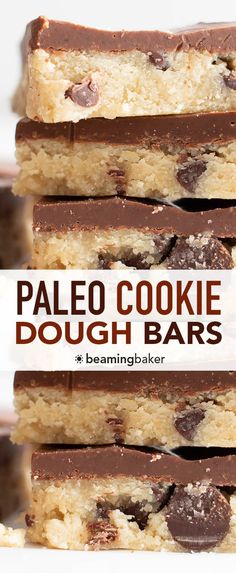 four pieces of paleo cookie dough bars stacked on top of each other with chocolate chips