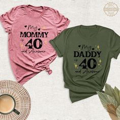 My Mommy Daddy 40 and Awesome Shirt, Custom Dad Birthday Tshirt, 40th Birthday Party Tee, Mama Birthday Tee, 40th Birthday Party Mom Dad Tee. The perfect gift for parents celebrating their 40th birthday. With its fun design, it offers elegance and represents a special moment. Thanks to its comfortable fabric, it also provides comfort in daily use. Strengthening family ties, this t-shirt is a great option to wear at a party or on an ordinary day! Welcome to BestMomentTees! Step into a world of co Onederful Mom And Dad Shirt, Family Matching T-shirt With Graphic Print For Birthday, Dad Of The Birthday Princess Shirt, Family Matching T-shirt For First Birthday And Father's Day, Personalized T-shirt For First Birthday On Father's Day, Handmade Shirts, Mommy Shirts, Birthday Tshirts, Birthday Tee