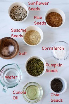 different types of seeds in small bowls on a white counter top with the words sunflower seeds, flax seeds, cornstarch, pumpkin seeds, water, and chia oil