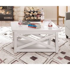 a white coffee table sitting on top of a rug