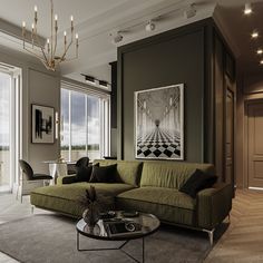 a living room filled with furniture and a chandelier hanging from the ceiling next to a large window