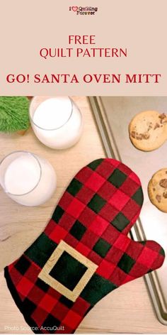 an oven mitt sitting on top of a counter next to some cookies and milk