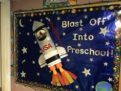 a bulletin board with a rocket on it