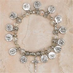 14 Stations of the Cross Stretch Italian Glass Bracelet-Diamond. Contains Medal with Images of the 14 Stations. Roman numerals on reverse side. Stained Glass Soldering, Rosary Ideas, Glass Soldering, Rosary Jewelry, Fencing Ideas, Stations Of The Cross, Holy Rosary, Catholic Jewelry, Rosary Bracelet