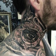 a man with a clock tattoo on his neck