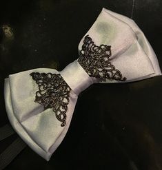 Grey lush bowtie Luxury Formal Bow Tie For Suit, Chic Satin Bow For Party, Adjustable Satin Bow Tie For Parties, Adjustable Satin Bow For Party, Classic Bow With Butterfly Knot For Party, Classic Butterfly Knot Bow For Party, Elegant Bow With Butterfly Knot For Black-tie Events, Elegant Bow With Black Ribbon As Gift, Elegant Black Ribbon Bow As Gift