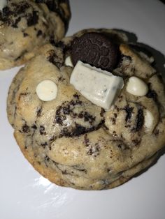 two cookies with oreos and cheese on them