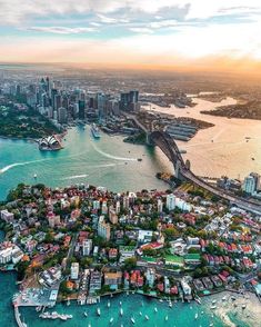 an aerial view of sydney, australia with the harbor and city in the foreground