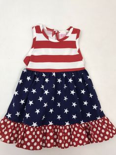 Ricrac & Ruffles Baby Girl 3/6 Month American Flag Tank Dress Red White Blue New without tags/bag Darling Cotton Tank Dress with red/white striped bodice, blue/white stars patterned skirt with red/white polka dot ruffle hem 1 button back keyhole closure, elastic back waist  Clean, smoke and pet free home Red Cotton Dress For Play, Blue Cotton Patriotic Dress, Red Cotton Casual Dress, Blue Patriotic Cotton Dress, Patriotic Blue Cotton Dress, Patriotic Sleeveless Red Dress, Cotton Tank Dress, Patterned Skirt, White Stars