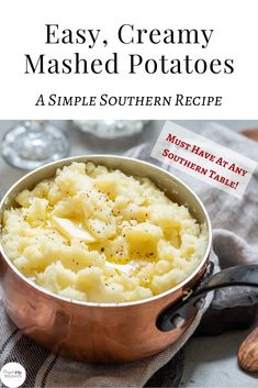 a pot filled with mashed potatoes on top of a table