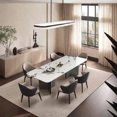 a dining room with a table and chairs in it