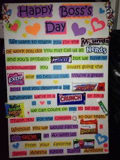 a sign that says happy boss's day with many different candy bars on it