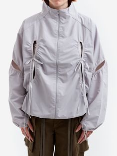 NACHE Cutout Windbreaker has a zip front closure, with cut out detailing throughout. The fabric has a light stretch to it ensuring a comfortable fit. 100% Polyester *Model is 5'7 and wears Size S Soft Techwear, Draping Ideas, Insta Outfits, Rain Wear, Light Grey, Casual Fashion, Cut Out, Active Wear, Comfort Fit