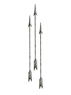 three metal arrows pointing in different directions