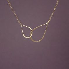 I love this necklace!Delicate and feminine, great for every day wear.Very nice gift for a mom.I used 14k Gold Filled wire to form 2 sizes of loops and attached them to delicate 14K Gold Filled chain.Necklace shown on the model measures 17" (total length; chain plus infinity symbol)Available also in Sterling Silver~~~~~~~~~~~~~~~~~~~~~~~~~~~~~~~~~~~~~~~~~~~~~~~~~~~~~~~~~~~~Before you purchase please read my shop policies for shipping information, return/exchange policy, and more: http://www.etsy. Gold Infinity Necklace, Infinity Necklace Gold, Eternity Necklace, Thick Necklace, Dangle Necklaces, Diy Wire Jewelry, Infinity Necklace, Infinity Symbol, Gold Necklace Women