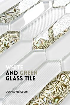 white and green glass tile with an intricate design