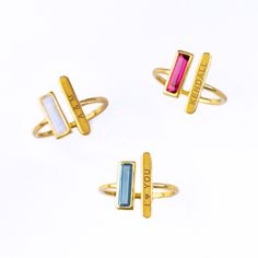 Breaking new ground with these adjustable Adira Series dainty gemstone and engraved bar rings. This modern bar ring features a carefully faceted rectangular natural birthstone paired with a bar engraved with a name, date or phrase.  Perfect for weddings, bridal parties, everyday, date night, and birthdays! Gemstone is approximately 10 x 3 mm (0.3 x 0.1 inches). This ring is available in different US SIZES ✦ Adjustable Size 5-6 ✦ Adjustable Size 7-8 ✦ Adjustable Size 9-10 Metal ✦ 18K Yellow Gold Modern Adjustable Birthstone Jewelry, Adjustable Open Ring Midi Rings As Gift, Modern Adjustable Stackable Rings For Gifts, Modern Adjustable Stackable Rings As A Gift, Minimalist Nickel-free Engraved Ring As Gift, Minimalist Nickel-free Engraved Ring For Gift, Adjustable Open Engraved Ring For Gift, Modern Rings With Birthstone For Gifts, Personalized Adjustable Crystal Ring As Gift