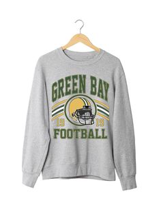 Jerzees Nu Blend Crewneck Sweatshirt in Oxford color with Green Bay Packer Design Crew Neck T-shirt For Game Day In Fall, Green Long Sleeve Sweatshirt For Game Day, Winter Crew Neck Tops With Screen Print, Winter Game Day Long Sleeve Tops, Winter Game Day Relaxed Fit Tops, Winter Long Sleeve Tops For Game Day, Game Day Green Winter Sweatshirt, Green Sweatshirt For Game Day In Winter, Long Sleeve T-shirt For Football Season