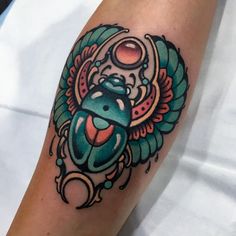 a colorful tattoo on the arm of a person