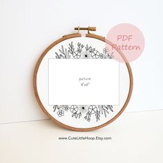 an embroidery project with the words, pictures and flowers on it in front of a white background