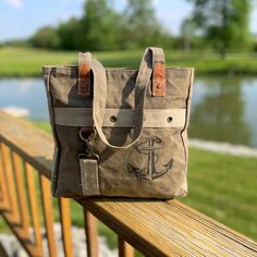 Navy, Nautical, Faith, Hope, Happiness and Strength...The anchor symbolizes so many things! Our Anchor Tote works as a small tote or shoulder bag and is lightweight, durable and strong. Constructed of repurposed Military Canvas and made to last. Details here --> https://bit.ly/AnchorToteBag Our entire selection here --> www.RecycledMilitaryBags.com Eco-friendly Upcycled Canvas Bag, Upcycled Canvas Bag For Everyday Use, Casual Canvas Bags With Upcycled Details, Upcycled Everyday Canvas Bag, Upcycled Canvas Tote Bag For Travel, Casual Upcycled Canvas Shoulder Bag, Eco-friendly Canvas Bag For Outdoor, Nautical Canvas Bags For Everyday Use, Travel Canvas Bag In Sail Color