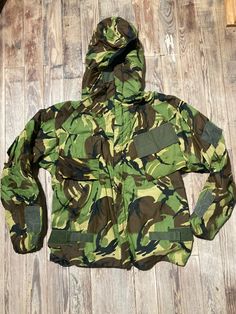 "Elastic around the face hood so sick!!  Waist 34\" Rise 15\" Hips 44\" Inseam 28\" Sleeve 23\" Chest 22\" Length 27\" Follow us on IG @inezandberyl" Military Camouflage Windbreaker For Winter, Military Camouflage Outerwear For Cold Weather, Camouflage Windbreaker For Winter Hunting, Camouflage Winter Hunting Parka, Winter Camouflage Windbreaker For Hunting, Winter Camouflage Hunting Parka, Winter Hunting Camouflage Windbreaker, Military Style Camouflage Windbreaker For Outdoor, Military Camouflage Windbreaker For Outdoor