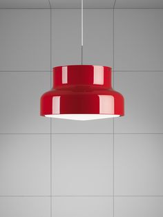 a red light hanging from the ceiling in a room