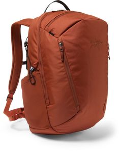 an orange backpack on a white background