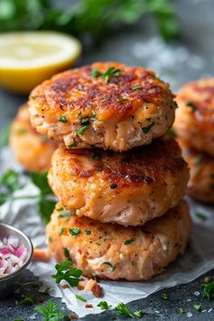 three crab cakes stacked on top of each other