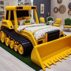 a bed made to look like a construction vehicle