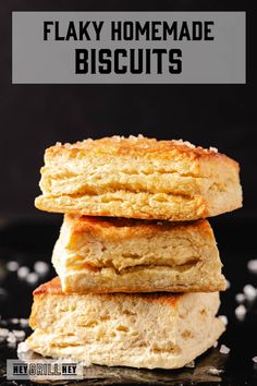 three biscuits stacked on top of each other with the words flaky homemade biscuits