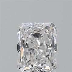 a cushion cut diamond on a gray background with the center stone in the shape of a square