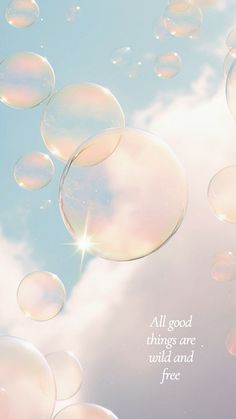 soap bubbles floating in the air with a quote above them that reads, all good things are wild and free