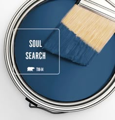 a paint can with the words soul search on it and an image of a brush