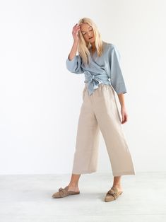 "RILEY is a wide leg cropped linen culottes. DETAILS - Cropped length - Seam pockets - Wide leg - Elasticated waist - 100% lightweight European linen fabric - Cut and sewn to order just for you in our studio COLOR - Beige, you can also choose other colors above - Fabric samples are available here https://www.etsy.com/listing/586569696/linen-fabric-samples SIZING & FIT - Fits true to size - Length is approximately 35.5 inches / 90 cm - Waist is approximately 13 inches / 33 cm - Inseam is appr Linen Pants For Women, Linen Wrap Top, Linen Culottes, Linen Slip Dress, Linen Kimono, Pants Linen, Wide Leg Linen Pants, Linen Pants Women, Linen Trousers