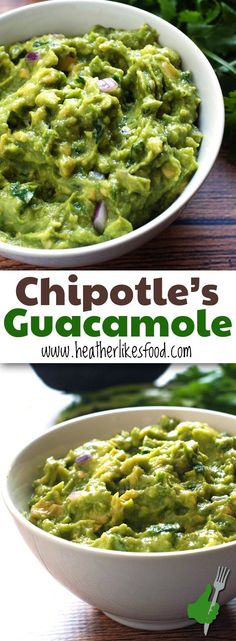 two white bowls filled with guacamole on top of a wooden table next to green leaves