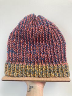 Stay warm this fall and winter season with this hand knit beanie!  Wool blend 100% hand made Knitted Wool Beanie One Size, Knit Beanie For Fall, One Size Fits Most, Acrylic Yarn Beanie For Fall, One Size Fits Most, Brown Knit Beanie For Outdoor, Brown Knit Hat, One Size Fits All, Adjustable Soft Knit Brown Beanie, Adjustable Brown Soft Knit Beanie, Brown Knit Hats One Size, Brown Knit Hats