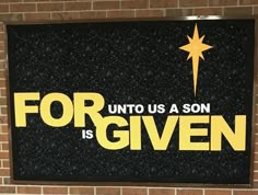 a sign on the wall that says for us a son is given with a star