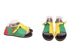 Step back in time with these vibrant Vintage '90s Color Blocking Leather Sandals, a true statement piece for any retro fashion enthusiast. These size 37 EU sandals feature a bold and playful combination of red, green, and yellow, embodying the spirit of the '90s with their eye-catching design. Crafted from genuine leather, these sandals offer both durability and comfort, making them perfect for summer strolls or adding a pop of color to your everyday ensemble. Embrace the nostalgia and make a fa Retro Open Toe Sandals With Rubber Sole, 90s Fashion Shoes, Retro Multicolor Open Toe Sandals, Retro Leather Sandals With 4-inch Heel, Green Slip-on Fun Sandals, Fun Green Slip-on Sandals, Green Leather Sandals With 4-inch Heel, Fashion Enthusiast, 90s Colors