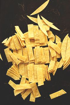 cut up pieces of food sitting on top of a table