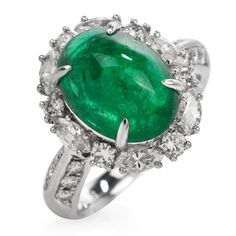 This exquisite GIA Natural Emerald & Diamond Cocktail Ring is expertly crafted in solid platinum with a total weight of 9.54 grams. The emerald with a weight of approx. 5.17 carats are surrounded by (6) round cut and (6) marquise cut genuine natural diamonds, (12) round-cut genuine natural diamonds placed on either side of the ring. All G-H color, and VS clarity forming a dazzling oval halo, The top of this piece measures 17 mm x 22 mm, 10 mm (height) currently US ring size 4.75 and sizable. Engagement Ring Photos, Diamond Cocktail Ring, Yellow Gold Wedding Band, Diamond Cocktail Rings, Platinum Ring, Marquise Cut, Jewelry Business, Gold Engagement, Miami Fl