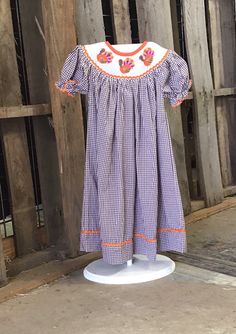 Hand smocked Thanksgiving Turkey dress for little girls. The turkeys are bright and colorful that make this dress pop! I also have the matching coveralls. Turkey Dress, Hand Smock, Thanksgiving Turkey, Houston Tx, Smocking, Houston, Girls Dresses, Thanksgiving